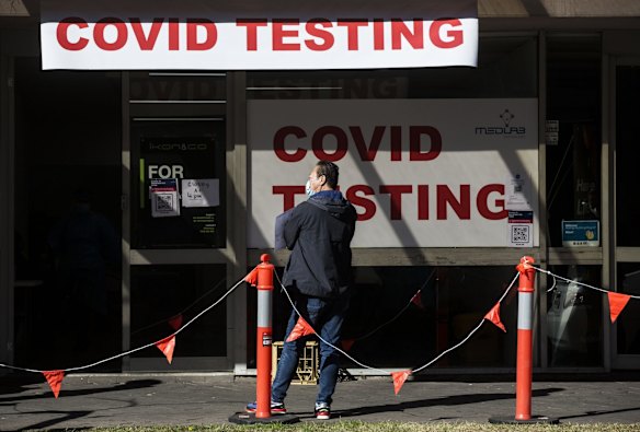 People queue down Ninth Street in Campsie to get tested at a Covid Testing Clinic. Campsie in South West Sydney is considered a COVID hotspot.