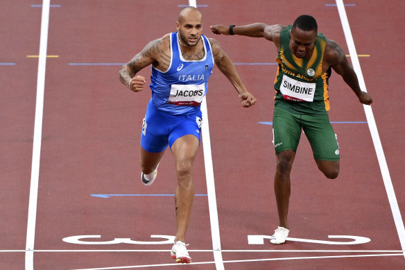 Lamont Jacobs gets in front to win gold in the men’s 100m in Tokyo. 