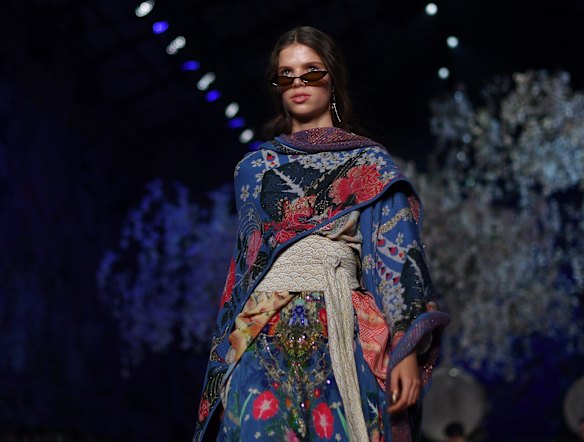 A model walks the runway wearing creations by Camilla at Mercedes-Benz Fashion Week Australia in Sydney.