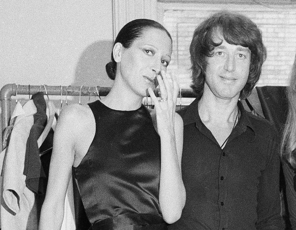 Elsa Peretti, left, poses with designer Halston after a fashion show in New York on June 15, 1970. 