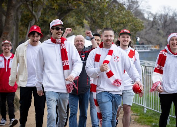 Swans fans attend the AFL Grand Final parade 