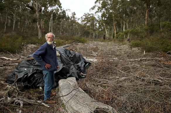 Chris Jonkers of the Lithgow Environment Group at East Wolgan swamp which has been extensively damaged by polluted mine water pumped into it and ground cracking causing the swamp to drain and dry out.