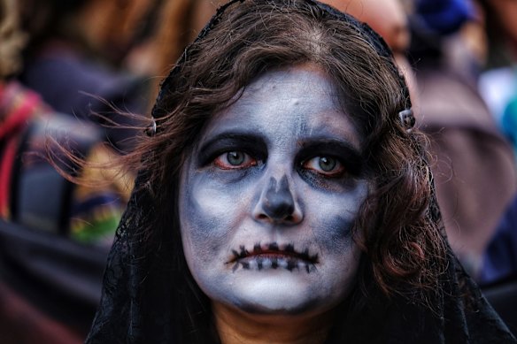 Protesters take part in the Climate Emergency XR Snap Rally in Melbourne.