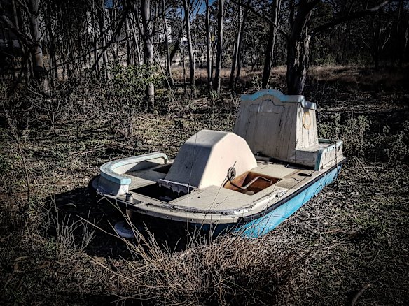 At Warragamba, Funland, once filled with children's rides such as trains, metal slides, a merry-go-round and a small ferris wheel, is now in total rusty disrepair.
