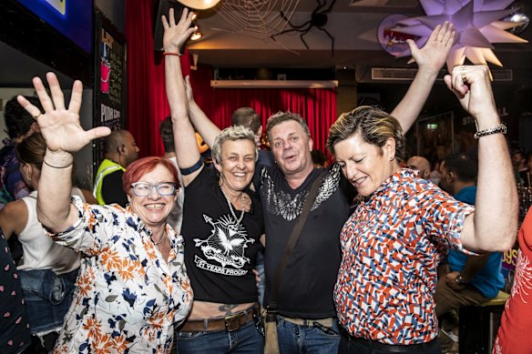 Christine Forster (right) is pictured with her wife, Virgina Flitcroft (left) and Stonewall nightclub management, Lida Warren and Glen Harris as they celebrate no lockout laws.