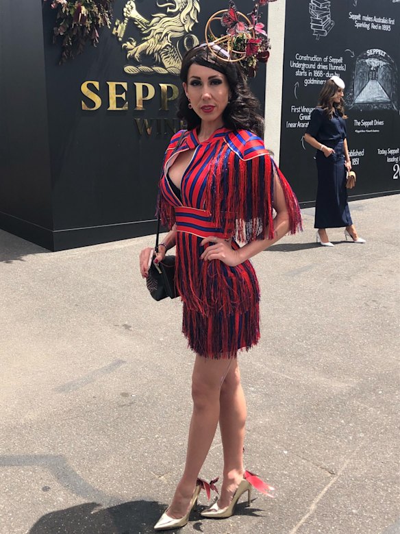Erin Sokolowsky wears her own hat and shoe embellishment in the Birdcage on Oaks Day 2018.