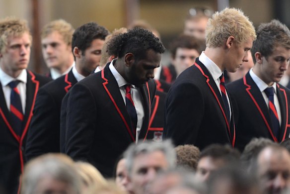 State Funeral for Jim Stynes at St Pauls Cathedral in Melbourne, current Melbourne players including Liam Jurrah at the funeral.