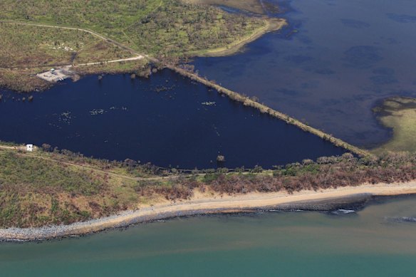 The Abbott Point coal loading facility with coal water run off moving North West into the Wetlands and coal deposits on the beaches.