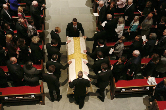 The casket is brought into St Martin's Episcopal Church.