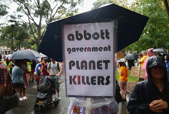SYDNEY, AUSTRALIA - MARCH 16:  Protesters demonstrate against the Abbott led Coalition Government on March 16, 2014 in Sydney, Australia. March In March is a nationwide grassroots protest organized to deliver a statement of no confidence in the current Australian Government.  (Photo by Don Arnold/Getty Images)