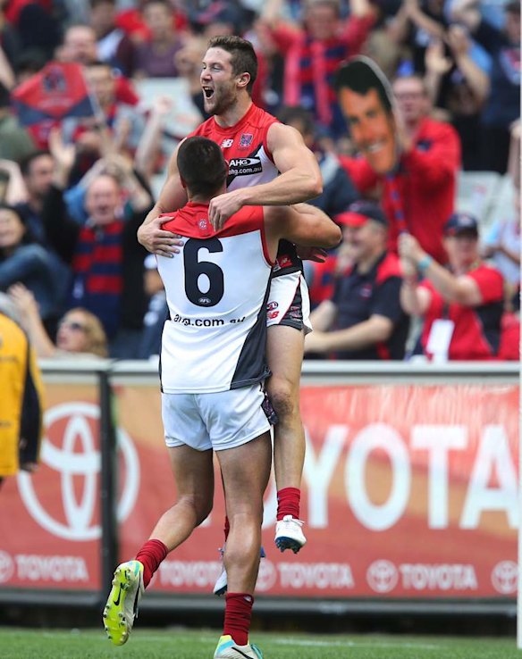 James Frawley and Chris Dawes celebrate a goal.