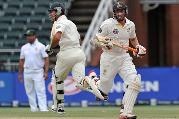 Ricky Ponting and Michael Hussey amble through for a single.