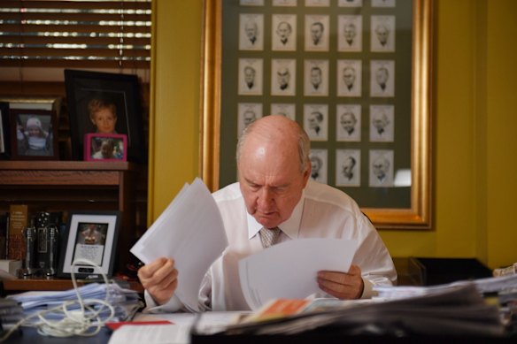 Alan Jones on air on Tuesday morning and then reviewing letters in his office.
Photo Nick Moir 24 sept 2019