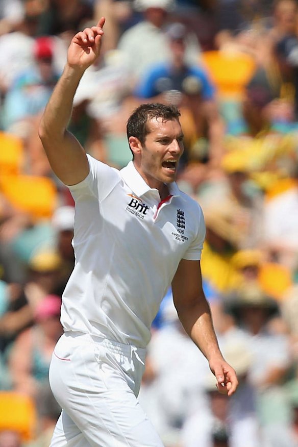 BRISBANE, AUSTRALIA - NOVEMBER 23:  Chris Tremlett of England celebrates after dismissing Steve Smith of Australia during day three of the First Ashes Test match between Australia and England at The Gabba on November 23, 2013 in Brisbane, Australia.