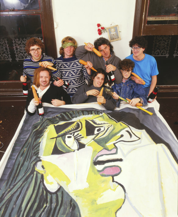 The Dockers with the  Weeping Woman duvet cover they made for the cover of the single Die Yuppie Die.