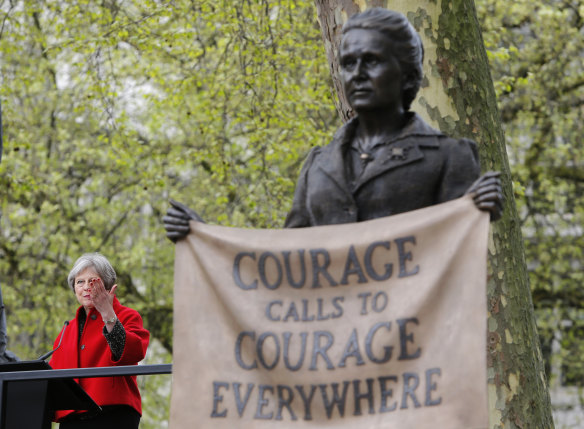 British Prime Minister Theresa May speaks after the unveiling a statue of Millicent Fawcett in Parliament Square, London.