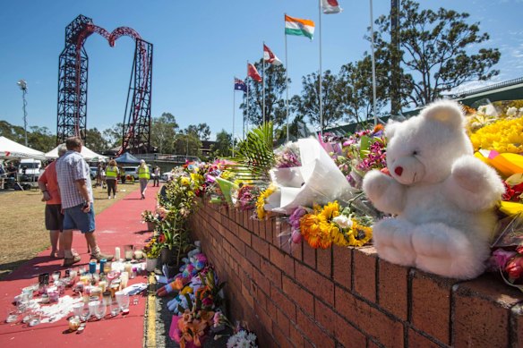 Flower tributes at Dreamworld where four people died after a malfunction with the 'Thunder River Rapids' at the theme park.