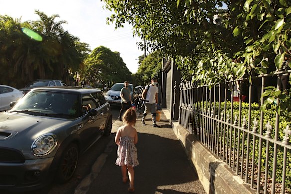 Grace and Jacky make their way home after dropping off her sister at school.