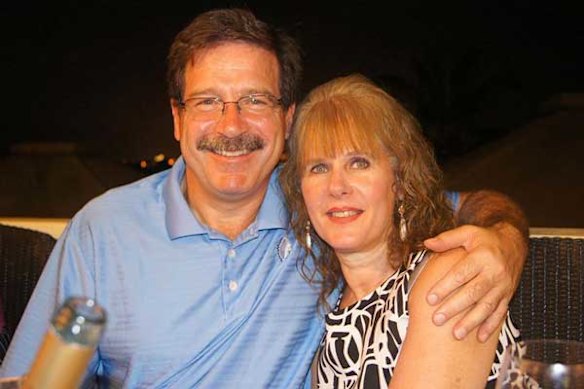 Mary Sherlach, the school psychologist, poses with her husband Mark.