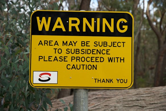 A sign erected by Springvale Mine warning of the danger of subsidence. 