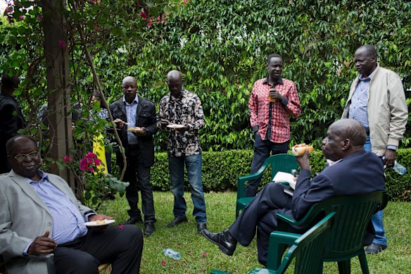 L-R Michael Hiriwo, Community Elder, Charles Ngoro, association member, Philip Menje, association member, Alfred Pitia association member, Herman Awona, Blacktown Council, and Alfred Pitia association member. At the home of Hugh McDermott, Labor member for Prospect, in Sydney. McDermott hosted a barbecue for the Sudanese Community