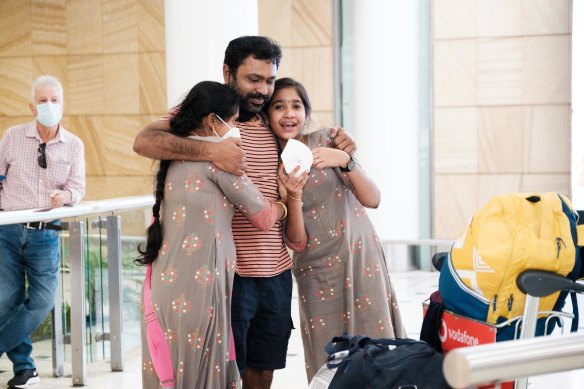 Travellers arrive at Sydney Airport on Friday, ahead of the reopening of Australia’s borders to vaccinated travellers on February 21.