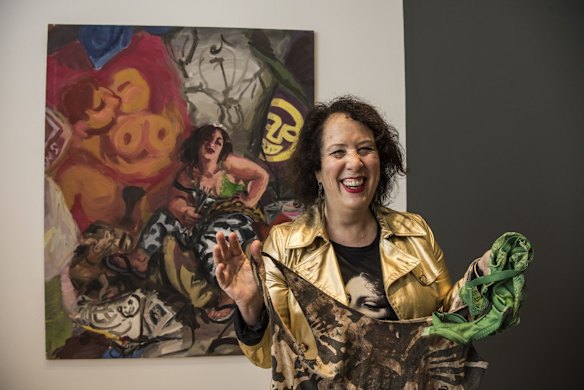 Artist Wendy Sharp with her winning self portrait which is in the Century of the Archibald show.