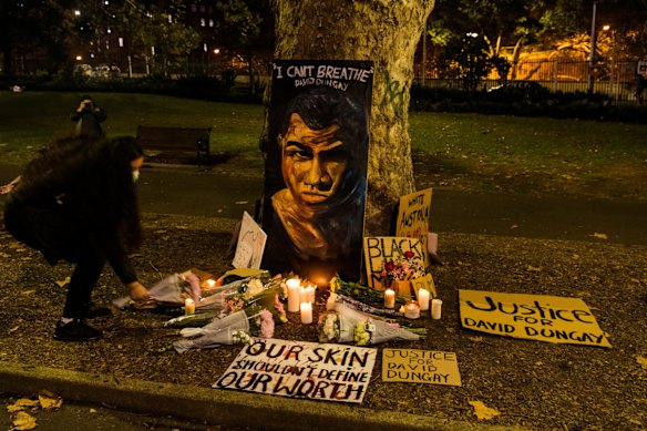 In Belmore Park is a memorial to indigenous man David Dungay who died in police custody, painted by Sydney man Jarred Eid. Thousands marched in Sydney to protest against the injustices of over 400 indigenous Australian deaths.