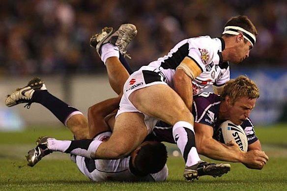 The Warriors try to slow down their opponents by bringing down Brett Finch.