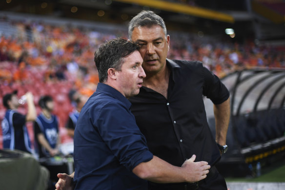 A happier moment: Brisbane Roar coach Robbie Fowler and Western United coach Mark Rudan.