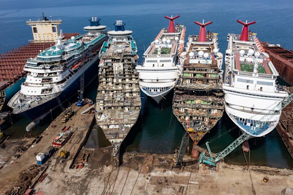 Five cruise ships are seen being broken down for scrap metal at the Aliaga ship recycling port in Izmir, Turkey. With the global coronavirus pandemic pushing the multi-billion dollar cruise industry into crisis, some cruise operators have been forced to cut losses and retire ships earlier than planned. The crisis however has bolstered the years intake of ships at the Aliaga ship recycling port with business up thirty percent on the previous year.  