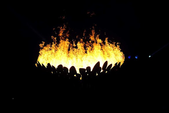 The Olympic cauldron is lit during the opening ceremony.