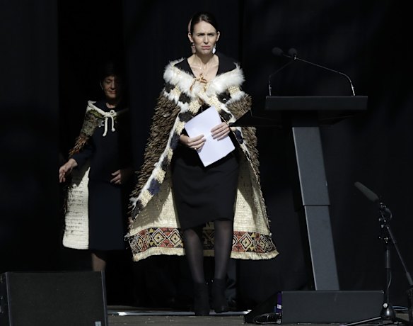 New Zealand Prime Minister Jacinda Ardern walks onto the stage to address a national remembrance service in Hagley Park.