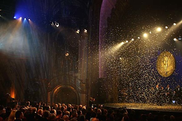 Confetti falls as Todd Carney is presented with the Dally M medal.