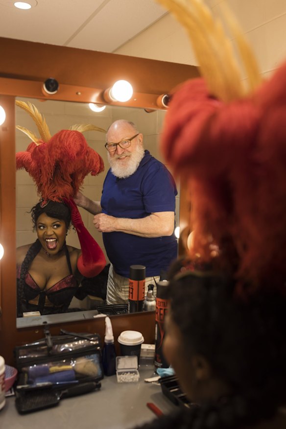 Senior milliner Rick McGill with performer Ruva Ngwenya from Moulin Rouge! The Musical!