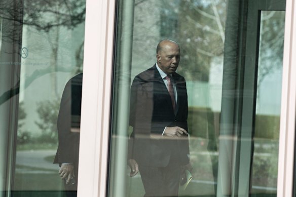 Peter Dutton MP walks back to his office after a party room meeting where he challenged Prime Minister Malcolm Turnbull for the Liberal Partys leadership at Parliament House in Canberra.
