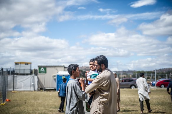 Members of Canberra's Muslim community outside Gungahlin Mosque on Saturday afternoon.