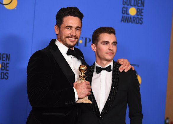 James Franco (left), winner of the award for best actor in a motion picture (musical or comedy) for <i>The Disaster Artist</i>, with his brother and co-star Dave Franco.