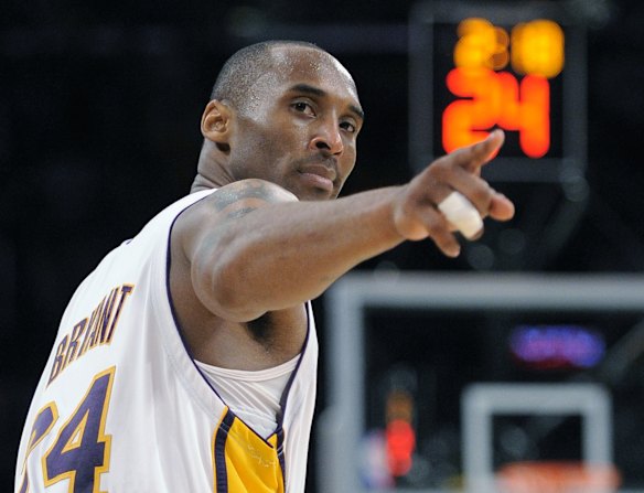 2009: Los Angeles Lakers guard Kobe Bryant points to a player behind him after making a basket in the closing seconds against the Orlando Magic in Game 2 of the NBA basketball finals in Los Angeles.