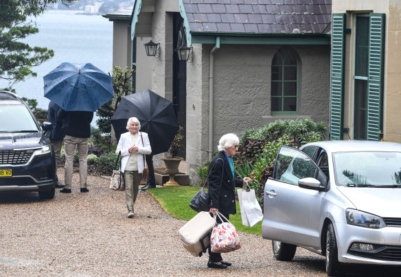 Scott Morrison’s mother and mother-in-law leave Kirribilli House.