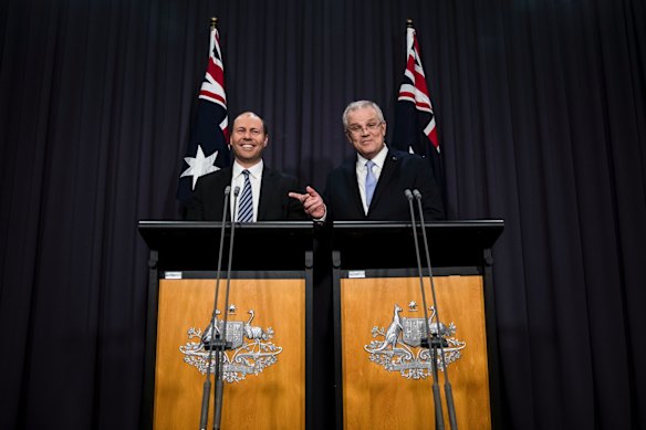 Incoming Prime Minister Scott Morrison and newly elected deputy leader of the Liberal Party Josh Frydenberg speak to media at Parliament House in Canberra.