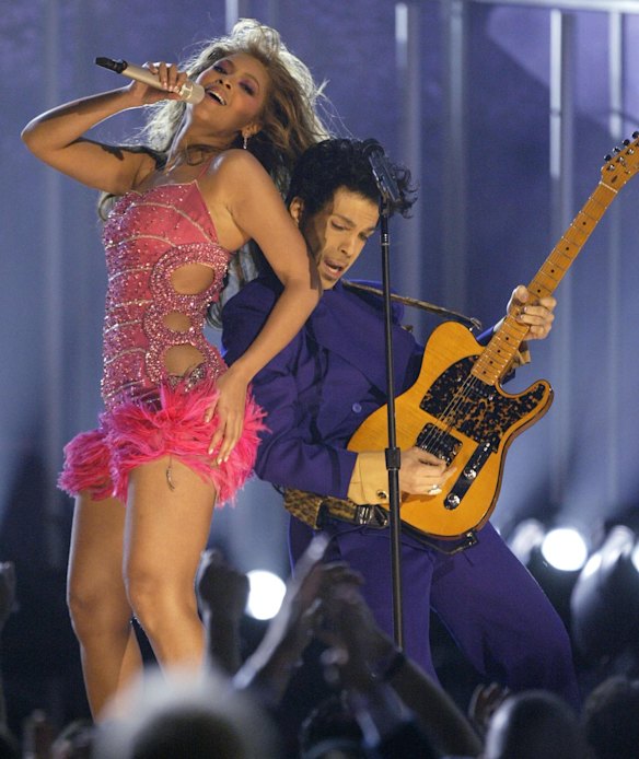 Beyonce, left, and Prince perform during the 46th Annual Grammy Awards in 2004.