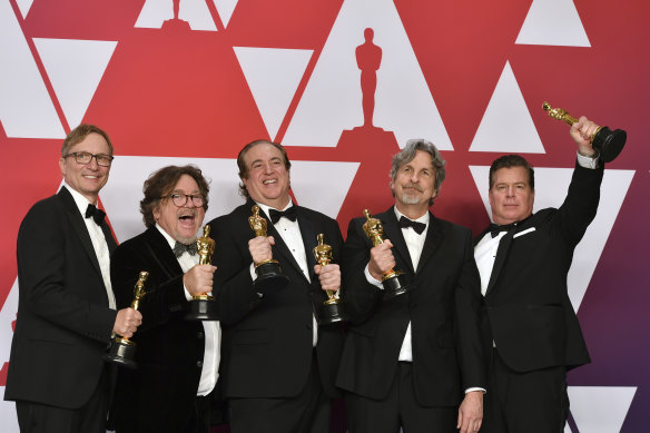 From left: Green Book producers Jim Burke, Charles B. Wessler, Nick Vallelonga, Peter Farrelly and Brian Currie pose with their Oscars after winning the award for best picture.