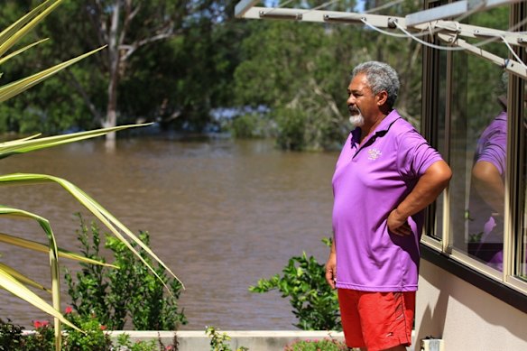 Eugene Kopa looks out at his Mount Warren park, now a river.
