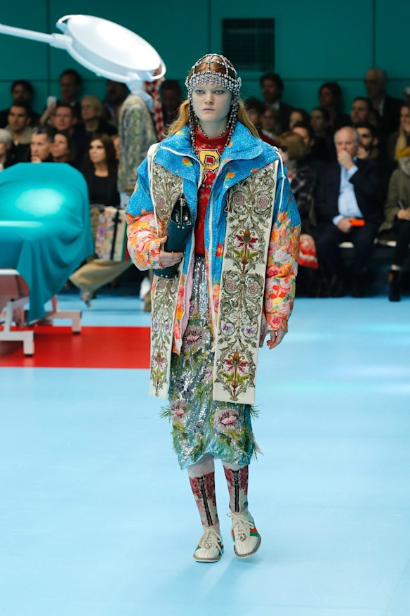 A model wears a creation as part of the Gucci women's Fall/Winter 2018-2019 collection
