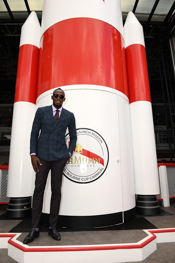 Usain Bolt at Mumm marquee in the Birdcage on Oaks Day 2018.