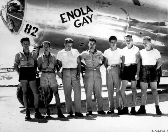 The ground crew of the  Enola Gay B29 bomber which bombed Hiroshima stands with pilot Col. Paul W. Tibbets, center, in the Marianas Islands.