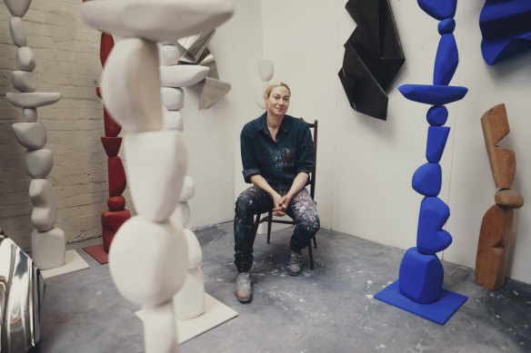 Former Olympic swimmer and world record-holder Clementine Stoney Maconachie with some of her sculptures in her Botany studio. 