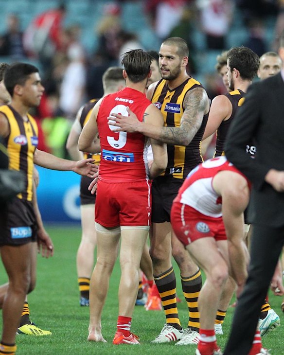 Good, not grand. Lance Franklin shakes hands with Nick Malceski after the Hawks beat the Swans in round 23.