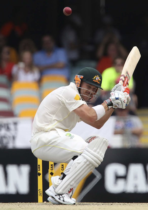 Australia's David Warner ducks under a bouncer.